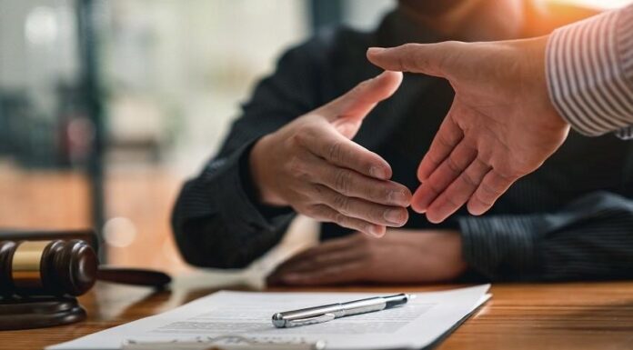 Barbier Mehtiyeva Law Firm: Your Trusted Partner for Cross-Border Dispute Resolution shake hands with judge