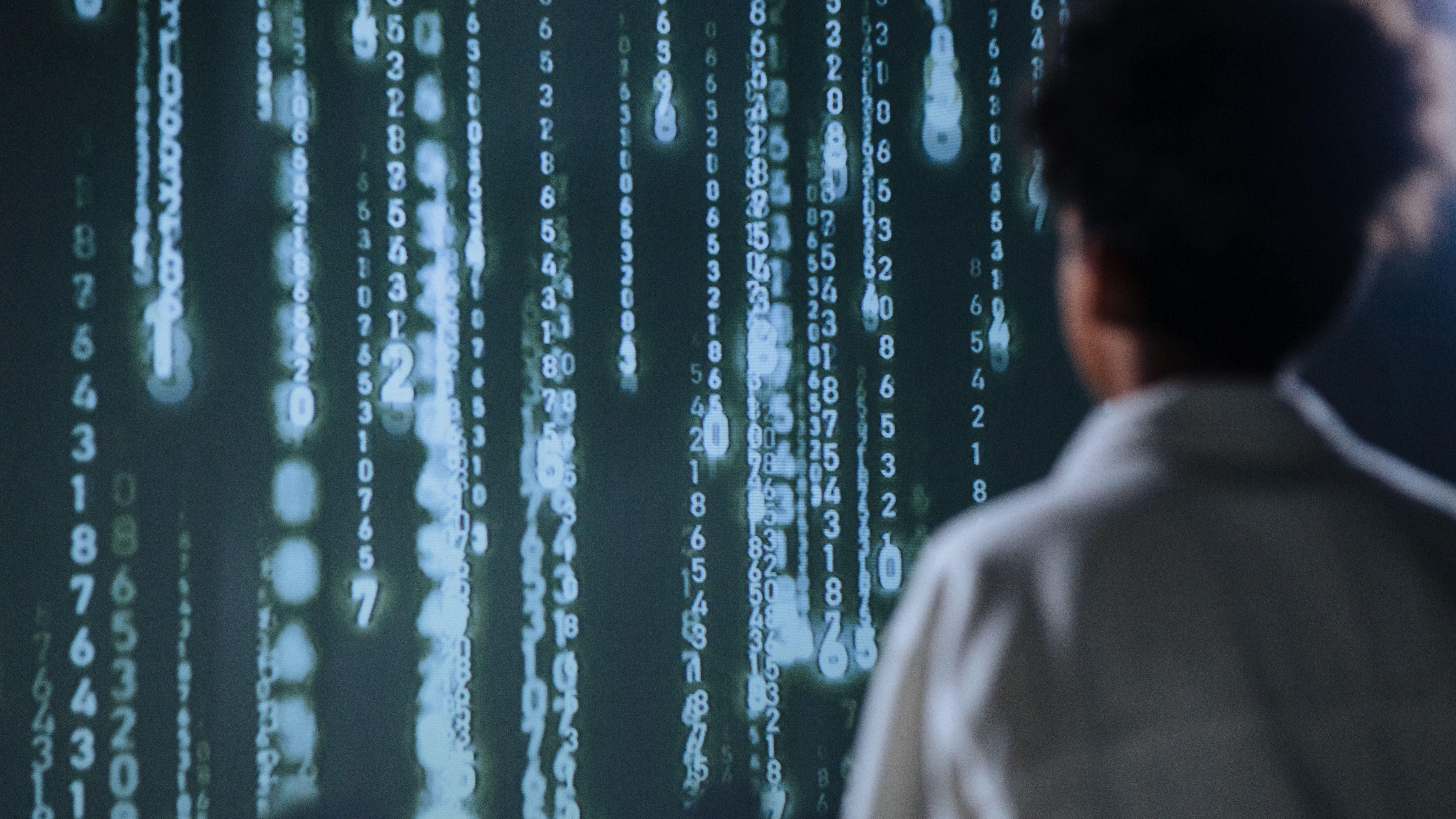 Attorney analyzing AI detection analytics on a glowing computer screen